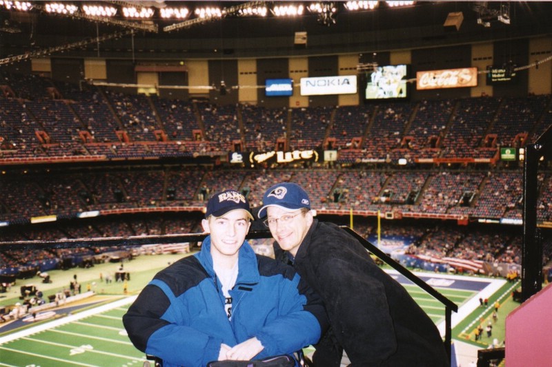 Ari with Steve, before an usher moved him closer to the field.jpg